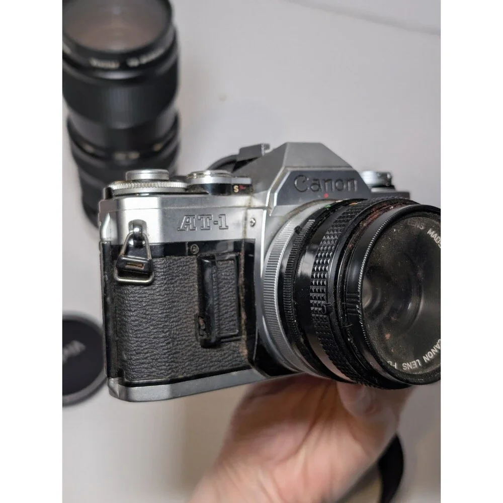 Canon AT-1 35mm Film Camera + 50mm f/1.8 Lens and Vivitar 75-205mm f/3.8 lens